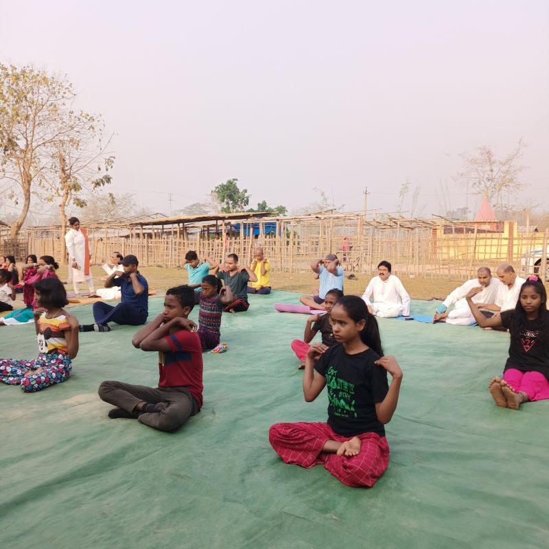 Participants of a one-day free yoga health camp held at Balijan English school, under Karbi Anglong on March 20.